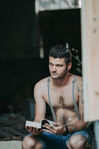 Young man using mobile phone