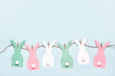 Close-up of christmas decorations against white background