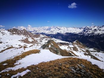 Scenic view of mountains against sky during winter