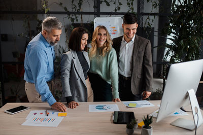 Business colleagues working at office