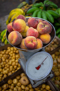 Delicious ripe peaches for sale at an urban street market
