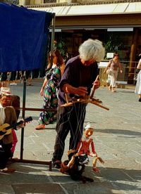 People on street in city