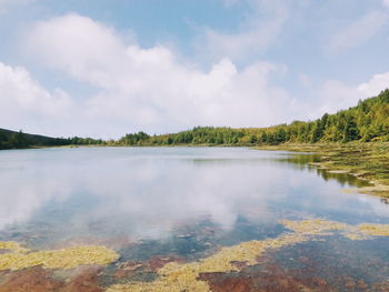 Scenic view of lake at archipelago of the azores against sky