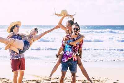 Friends enjoying at beach