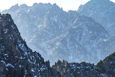 Scenic view of mountains against sky during winter