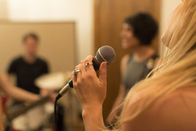 Young musicians practicing at a rehearsal space