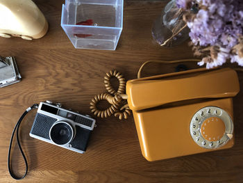 Directly above shot of clock on table