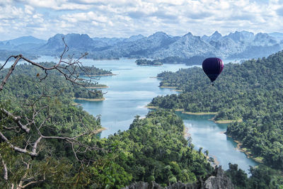 Hot air balloon flying over khao sok national park