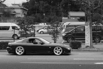 Cars parked on road