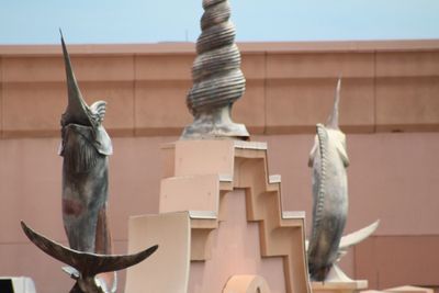 Close-up of fish statue