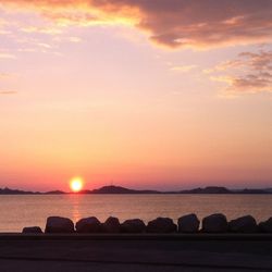 Scenic view of sea at sunset