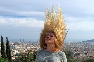 Woman looking at cityscape