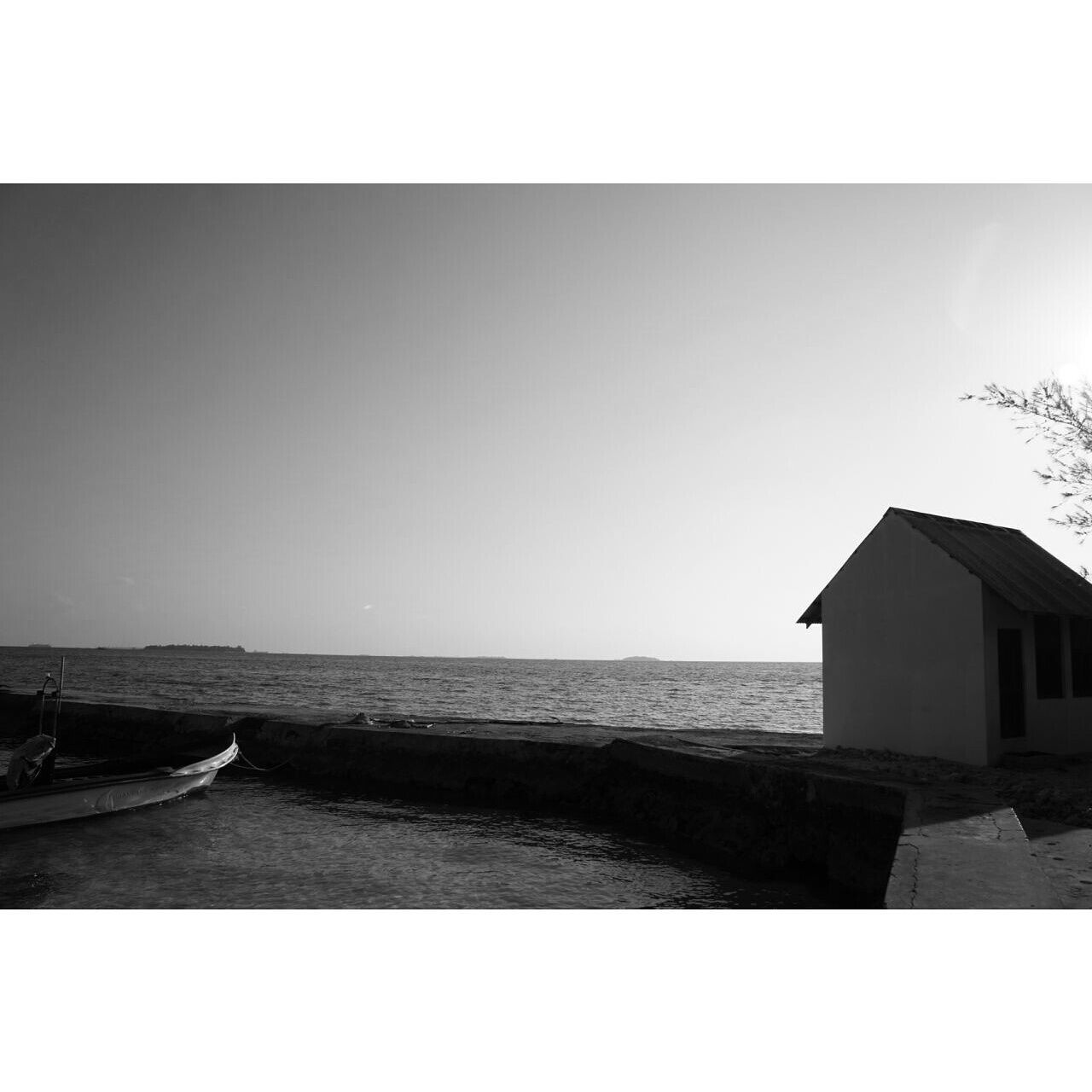 transfer print, sea, water, horizon over water, auto post production filter, clear sky, copy space, tranquil scene, scenics, tranquility, beauty in nature, nature, beach, sky, shore, built structure, outdoors, idyllic, sunlight, no people