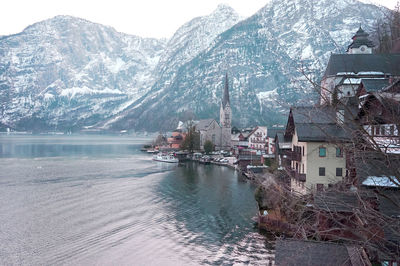 Panoramic view of buildings and mountains during winter