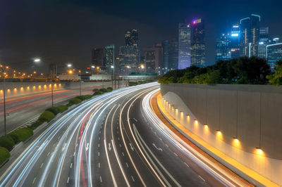 Singapore busy road and city background during rush hour in singapore city highway.