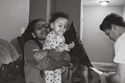 High angle view of mother and daughter at home