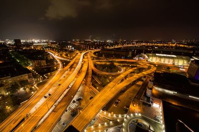 High angle view of illuminated highway at night