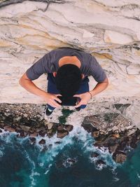 Full length of woman standing on shore