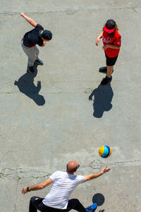 High angle view of men playing with ball