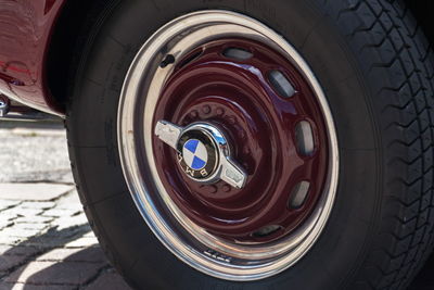 Close-up of vintage car on street