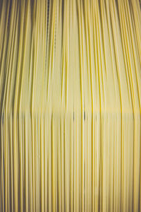 Full frame shot of spaghetti drying in factory