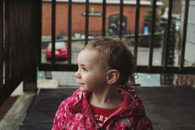 Portrait of cute girl looking away