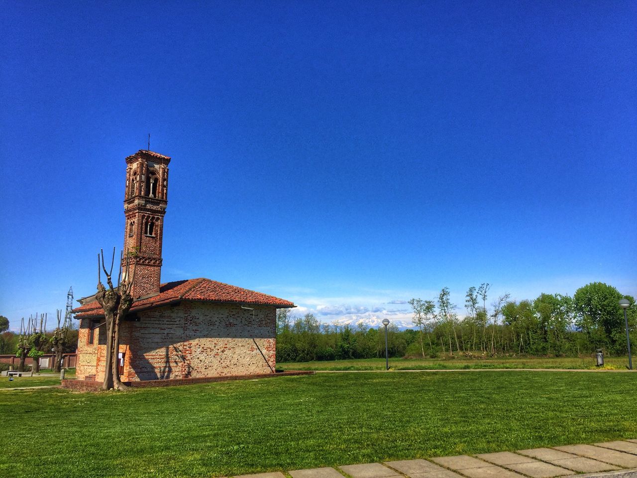 blue, built structure, architecture, building exterior, sky, nature, no people, grass, clear sky, field, agriculture, tree, rural scene, tranquility, scenics, outdoors, day, beauty in nature