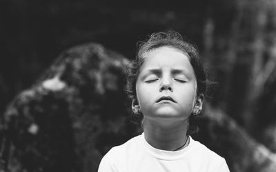 Close-up of girl with eyes closed