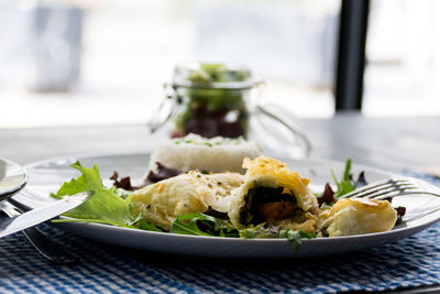 Close-up of food served on table