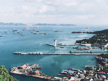 High angle view of boats moored at harbor