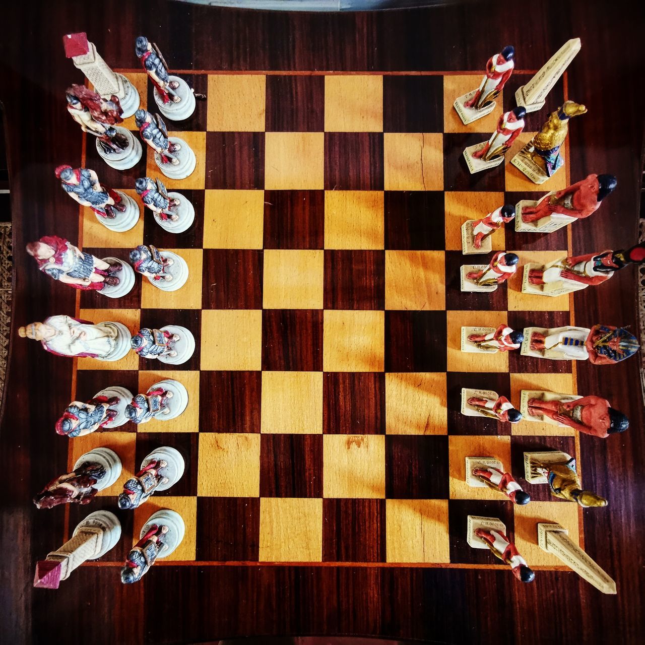 DIRECTLY ABOVE SHOT OF CHESS ON TABLE
