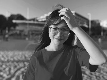 Portrait of woman standing outdoors