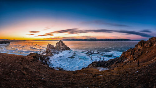 Scenic view of sea against sky during winter