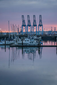 Cranes at the port of tacoma and and marina.