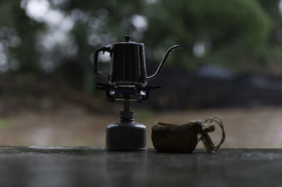 Close-up of machine part on table