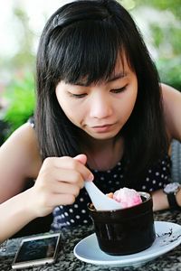 Portrait of woman with ice cream