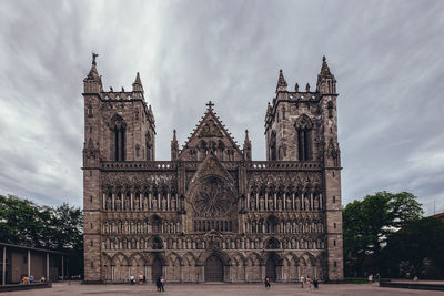 Low angle view of historic building against sky