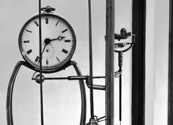 Close-up of clock on wall