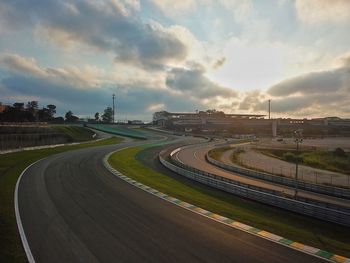 Panoramic view of road against sky in city