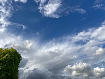 Low angle view of clouds in blue sky