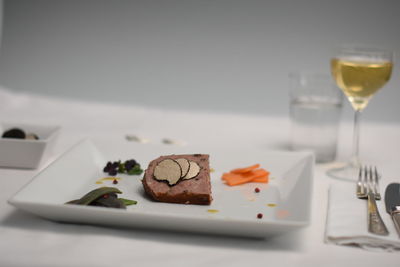 Close-up of drink served on table