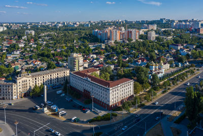 High angle view of street amidst buildings in city