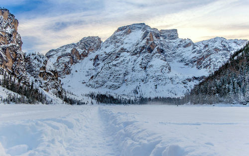 Snow covered mountains against sky