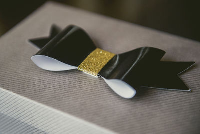 Close-up of tied bow on gift box