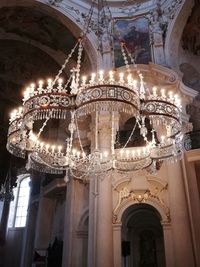 Low angle view of illuminated chandelier