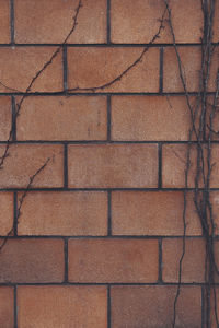 Full-frame background with a repeating symmetrical brick pattern