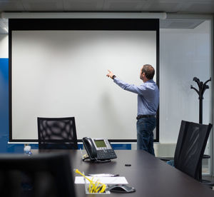 Men working in office