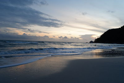 Scenic view of sea against sky at sunset