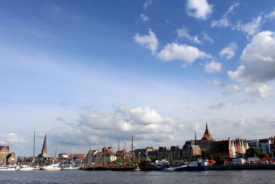 Boats moored at harbor