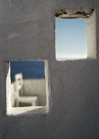 Low angle view of window on wall